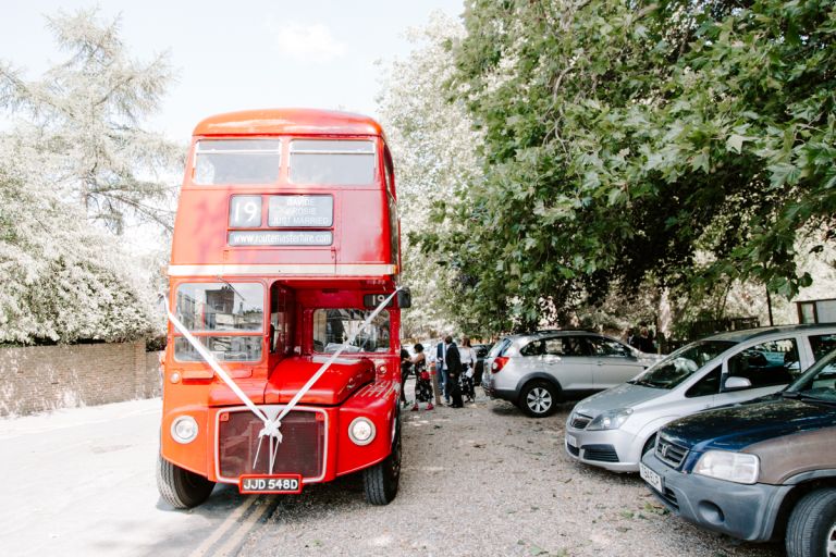Routemaster bus picking up wedding guest