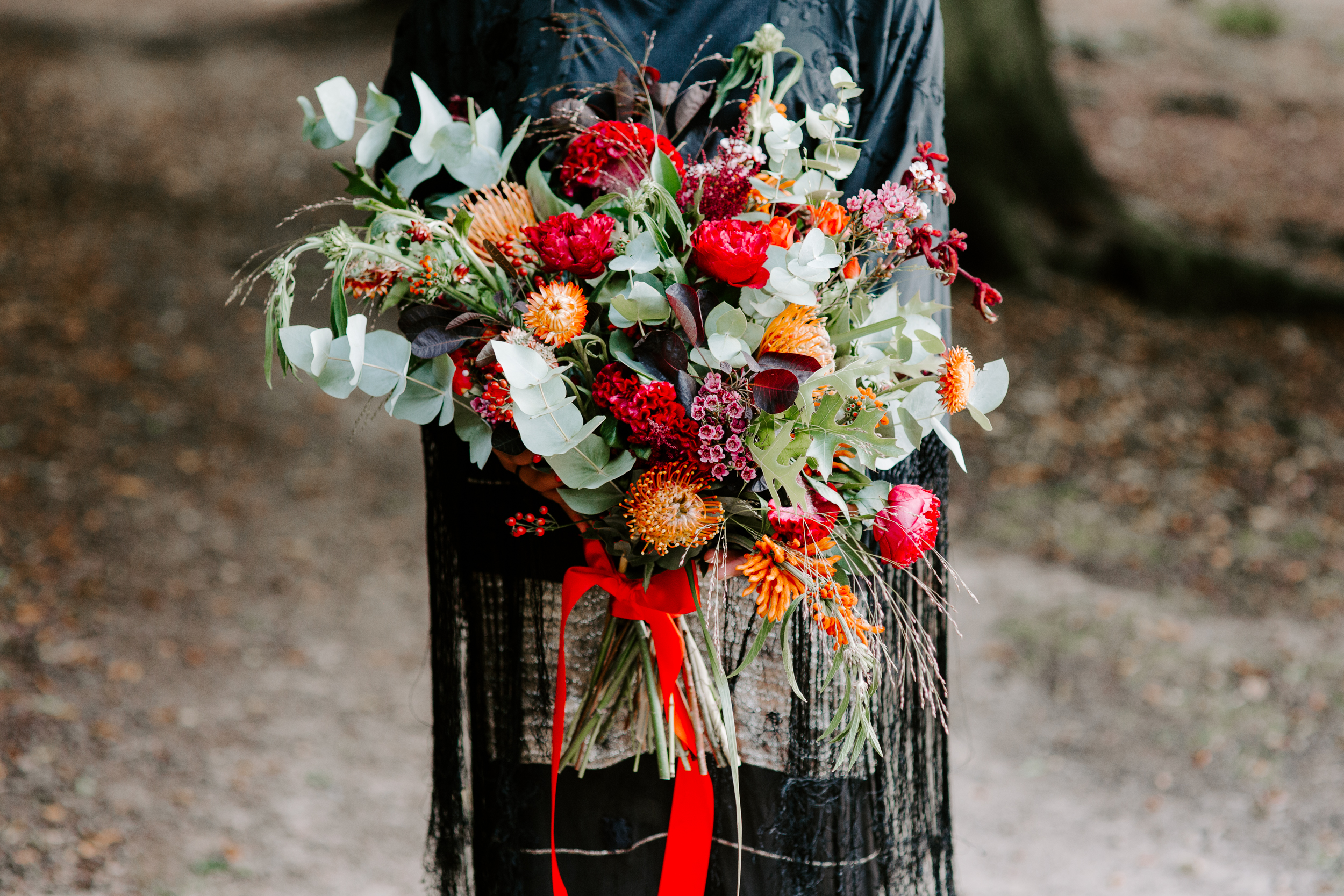 London autumn wedding bouquet with red ribbon